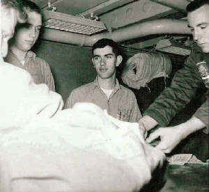 Navy/Migatz_Bergstrom_Treaster_Prior_are_we_Playing_cards_or_sorting_laundryForrestal_Dec_1961.jpg